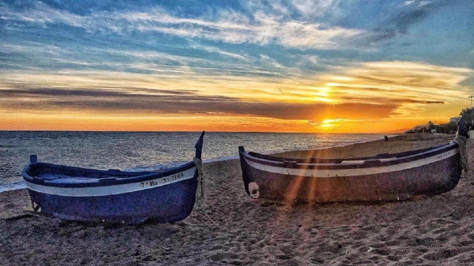 Posta de sol des del mar, sortides en barca en L'Escala